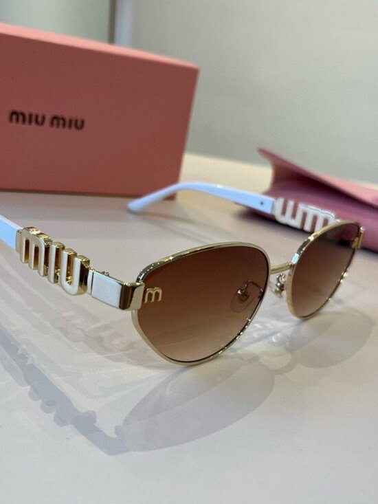 Miu Miu Cat-Eye Glasses with White Frames and Brown Lenses
